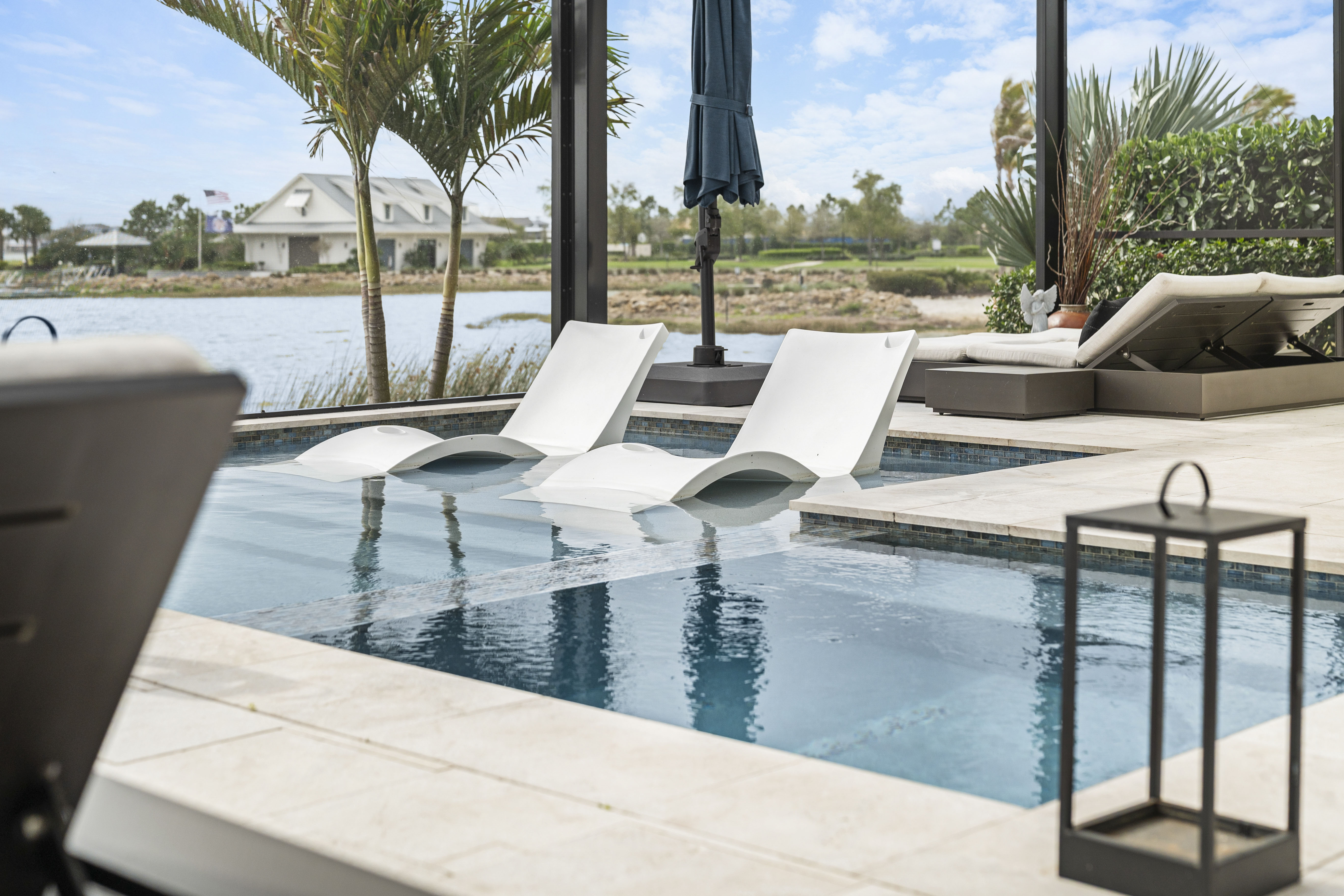 Custom pool design and construction on Casey Key, FL - Swim Inc. site-responsive design on narrow barrier island lot with Gulf views