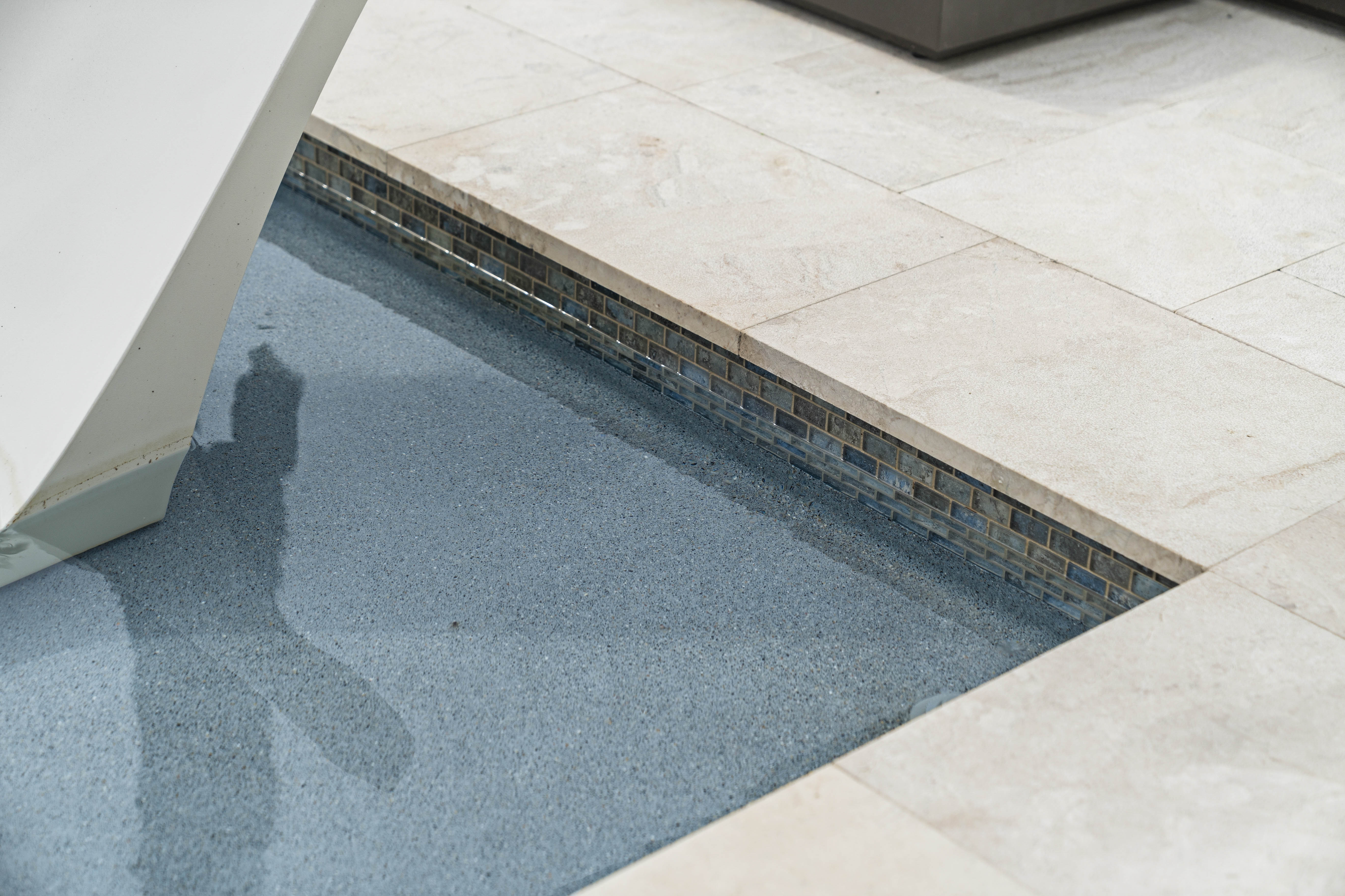 Custom pool design and construction on Longboat Key, FL - Swim Inc. vanishing edge pool with Gulf waterfront views