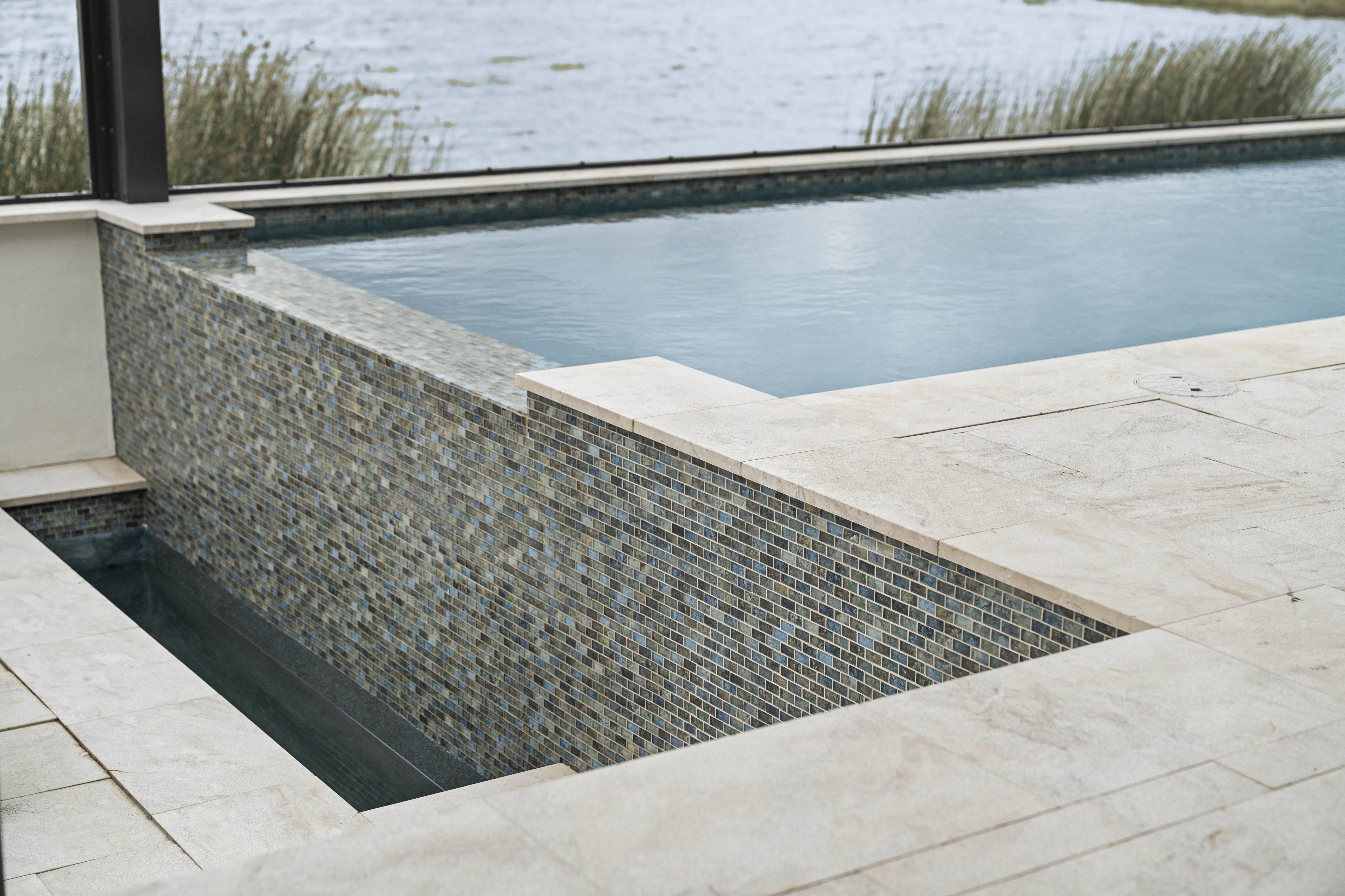 Pool renovation and resurfacing on Longboat Key, FL - Swim Inc. brings older island estate pools to current coastal compliance