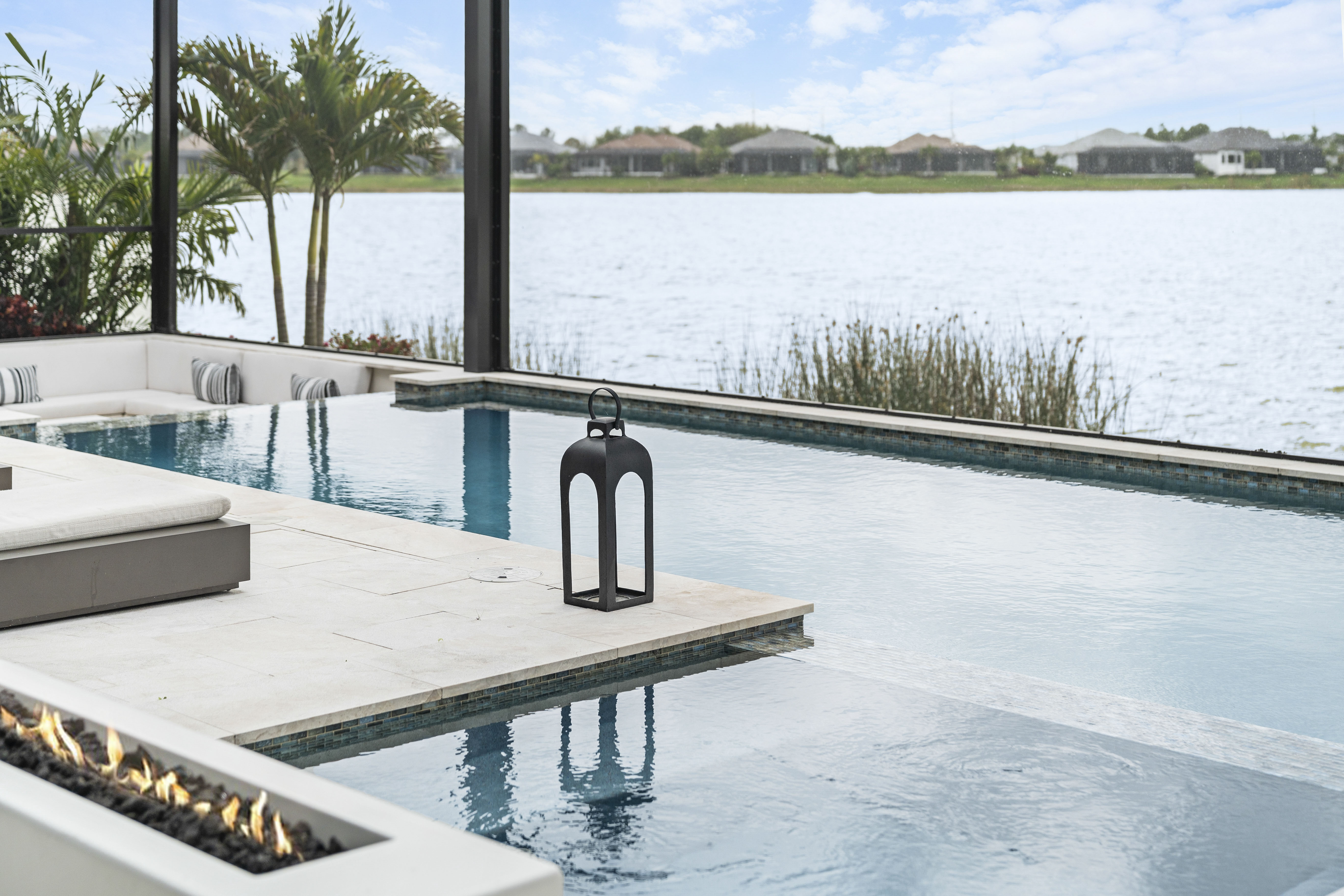 Lantern and lighting detail at the Lakewood Ranch vanishing edge pool, Swim Inc.