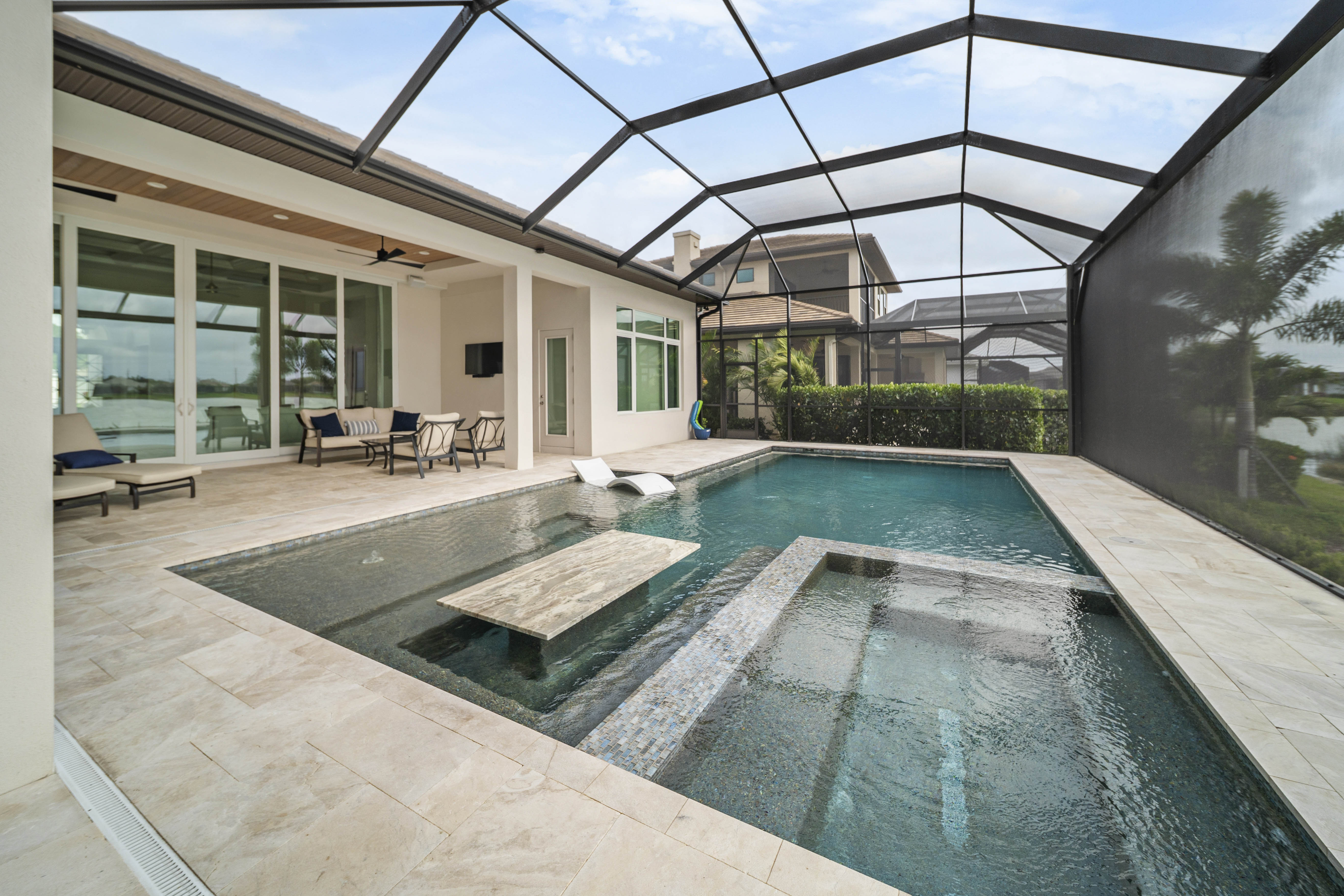 Covered lanai integrated with resort pool environment, Sarasota FL, Swim Inc.